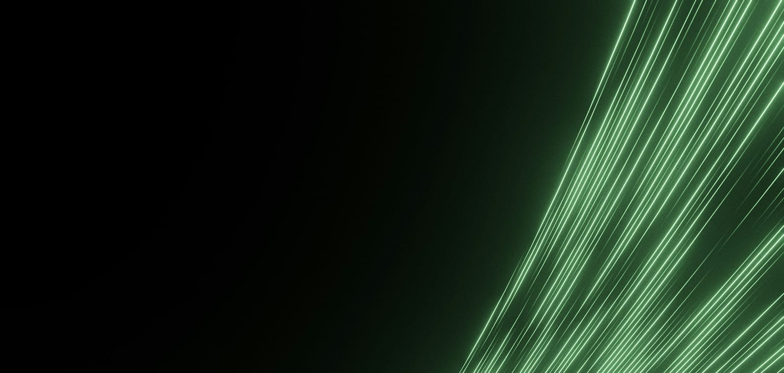 Strands of green fibre optic light streaming across a black field