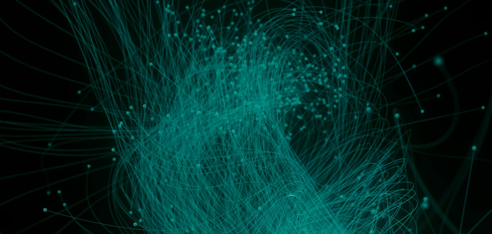 A dense bundle of teal fibre optic filaments fanning out against black